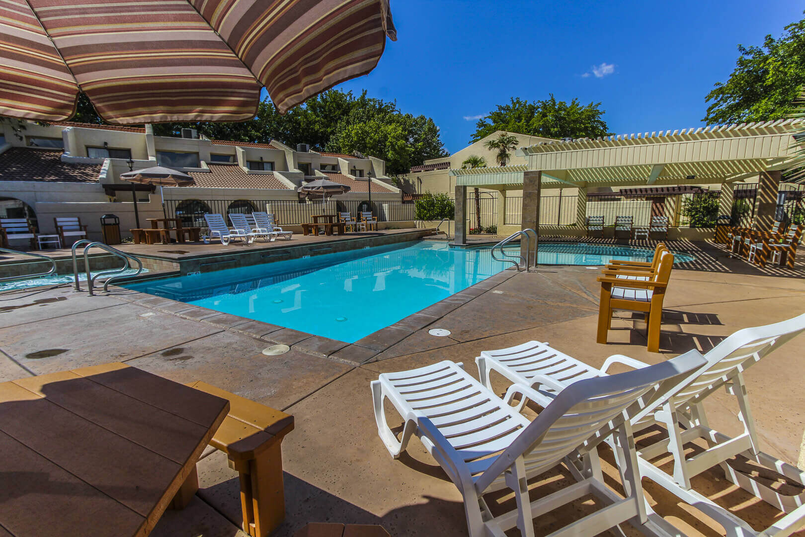 A refreshing outdoor swimming pool at VRI's Villas at South Gate in St. George, Utah.